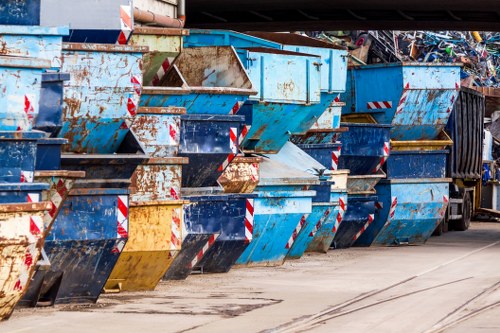 Household waste being loaded into a skip in Tufnell Park