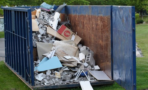 Construction site with waste materials being sorted for disposal