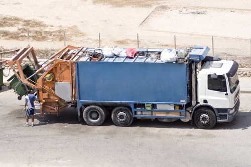 Electric van delivering a skip in a residential Tufnell Park street